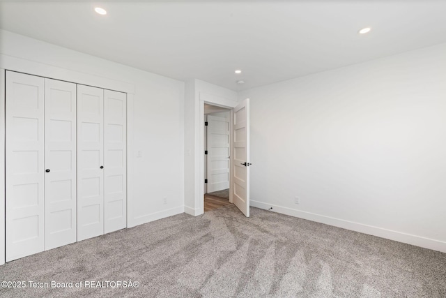 185 Columbine St, Alpine, WY 83128 - unfurnished bedroom featuring carpet floors, baseboards, recessed lighting, and a closet