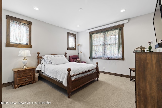 444 Riverview Dr, Alpine, WY 83128 - bedroom with light colored carpet, baseboards, and recessed lighting