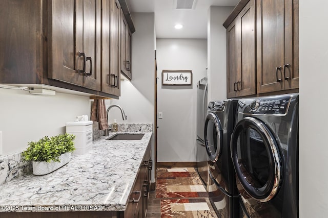 444 Riverview Dr, Alpine, WY 83128 - laundry area featuring cabinet space, separate washer and dryer, and recessed lighting