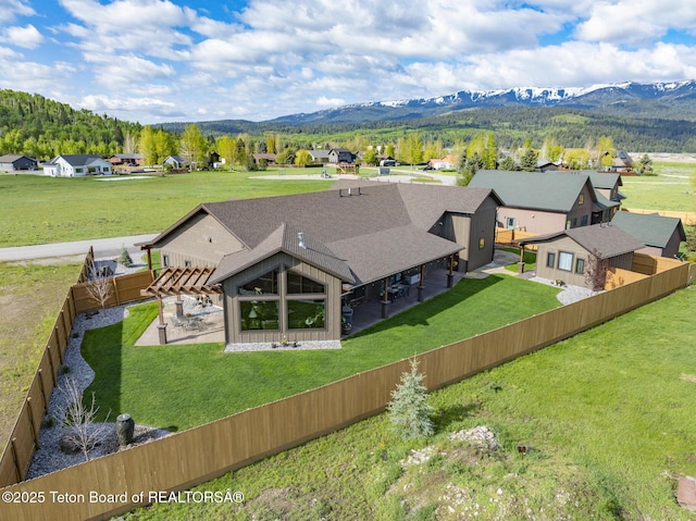 444 Riverview Dr, Alpine, WY 83128 - aerial view of residential area with a mountainous background