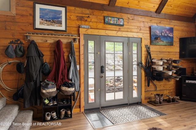 57 Lynx Trl, Alpine, WY 83128 - doorway to outside with wood finished floors, wooden walls, and wood ceiling with exposed beams