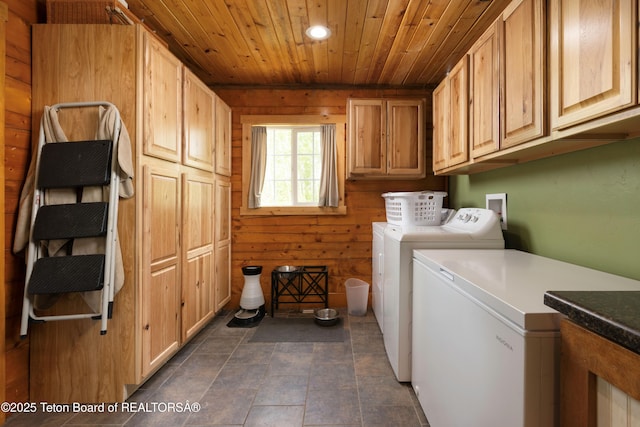 57 Lynx Trl, Alpine, WY 83128 - laundry room featuring cabinet space, independent washer and dryer, wood ceiling, recessed lighting, and wooden walls
