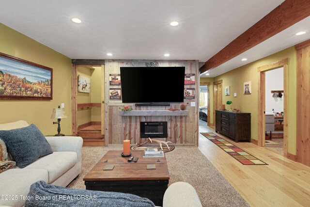 57 Lynx Trl, Alpine, WY 83128 - living area with recessed lighting, wood finished floors, and a glass covered fireplace