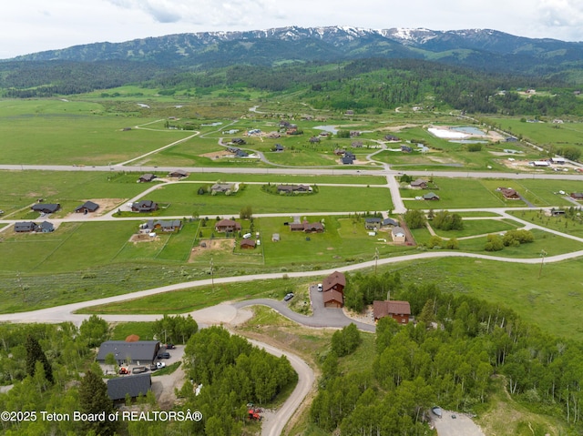57 Lynx Trl, Alpine, WY 83128 - aerial view of property's location with a mountain backdrop and rural landscape