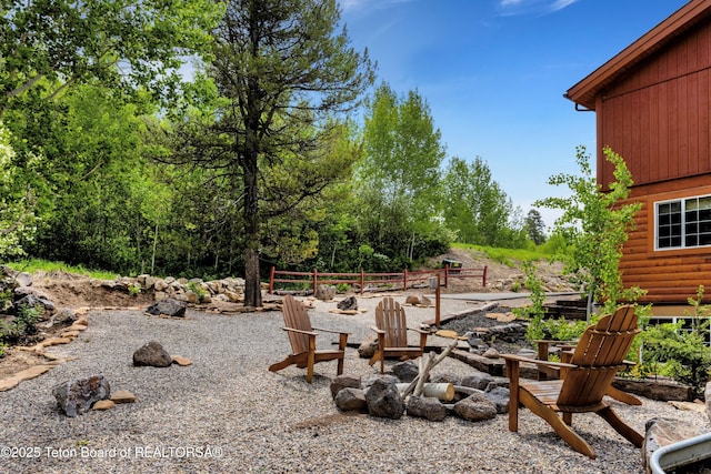 57 Lynx Trl, Alpine, WY 83128 - view of yard featuring an outdoor fire pit