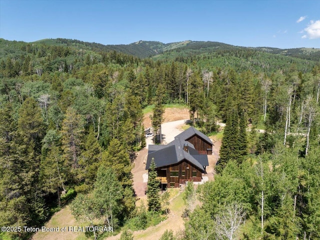 5727 Forest Ridge Rd, Victor, ID 83455 - view from above of property with a forest and a mountainous background