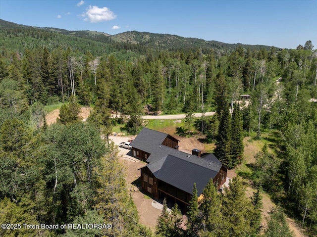 5727 Forest Ridge Rd, Victor, ID 83455 - view from above of property with a heavily wooded area