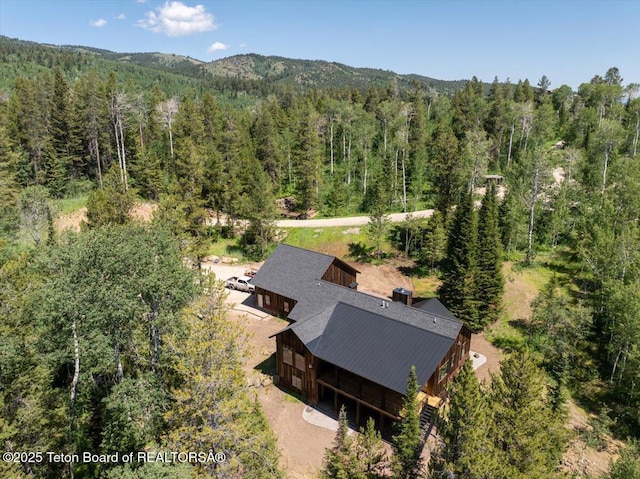 5727 Forest Ridge Rd, Victor, ID 83455 - aerial view of property and surrounding area with a heavily wooded area
