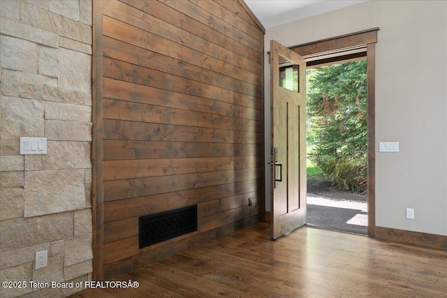5727 Forest Ridge Rd, Victor, ID 83455 - foyer featuring wood walls and wood finished floors