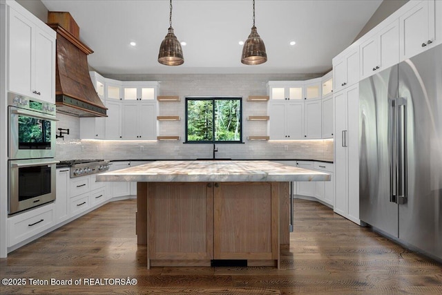5727 Forest Ridge Rd, Victor, ID 83455 - kitchen featuring appliances with stainless steel finishes, open shelves, wood counters, a center island, and tasteful backsplash