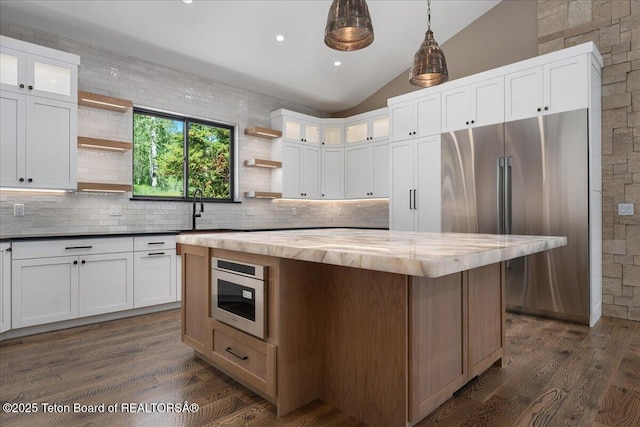 5727 Forest Ridge Rd, Victor, ID 83455 - kitchen featuring open shelves, high end fridge, vaulted ceiling, butcher block counters, and backsplash