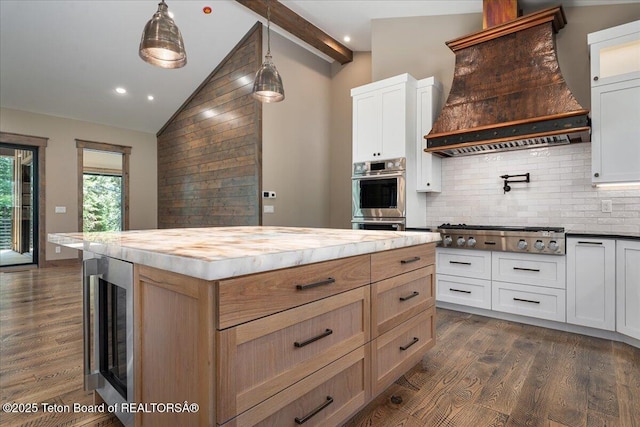 5727 Forest Ridge Rd, Victor, ID 83455 - kitchen featuring custom range hood, stainless steel appliances, beverage cooler, wood counters, and backsplash