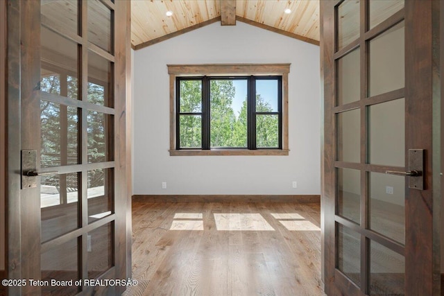 5727 Forest Ridge Rd, Victor, ID 83455 - foyer with french doors, wood finished floors, and wood ceiling