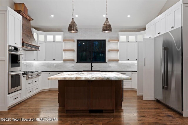 5727 Forest Ridge Rd, Victor, ID 83455 - kitchen featuring open shelves, appliances with stainless steel finishes, backsplash, a kitchen island, and recessed lighting