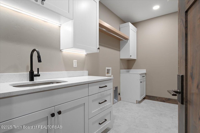 5727 Forest Ridge Rd, Victor, ID 83455 - laundry room featuring cabinet space, washer hookup, and recessed lighting