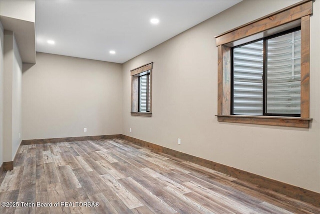 5727 Forest Ridge Rd, Victor, ID 83455 - spare room with wood finished floors and recessed lighting