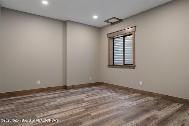 5727 Forest Ridge Rd, Victor, ID 83455 - spare room featuring wood finished floors and recessed lighting