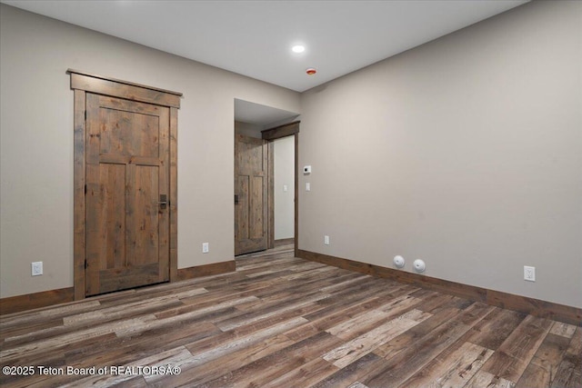 5727 Forest Ridge Rd, Victor, ID 83455 - unfurnished bedroom featuring wood finished floors and recessed lighting