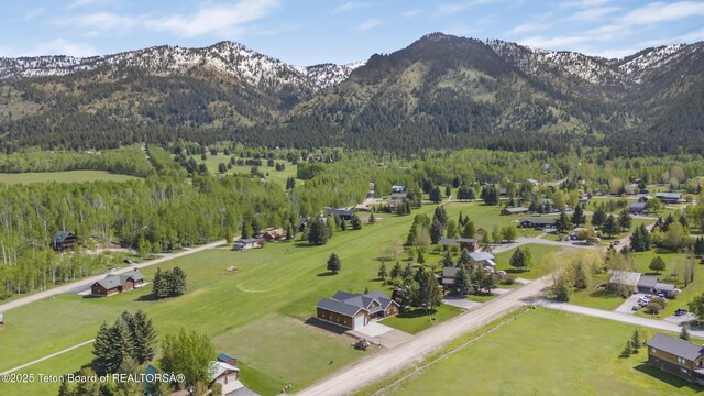 405 Vista Dr, Star Valley Ranch, WY 83127 - drone / aerial view of mountains and a heavily wooded area