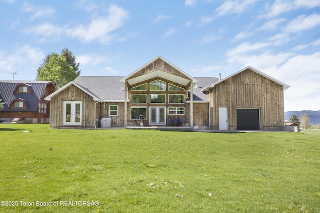 405 Vista Dr, Star Valley Ranch, WY 83127 - rear view of property featuring french doors and a yard