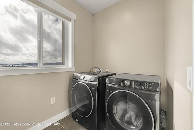 405 Vista Dr, Star Valley Ranch, WY 83127 - washroom with independent washer and dryer, baseboards, and tile patterned flooring