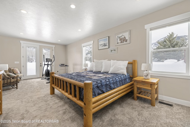 405 Vista Dr, Star Valley Ranch, WY 83127 - bedroom with carpet floors, access to exterior, recessed lighting, baseboards, and french doors
