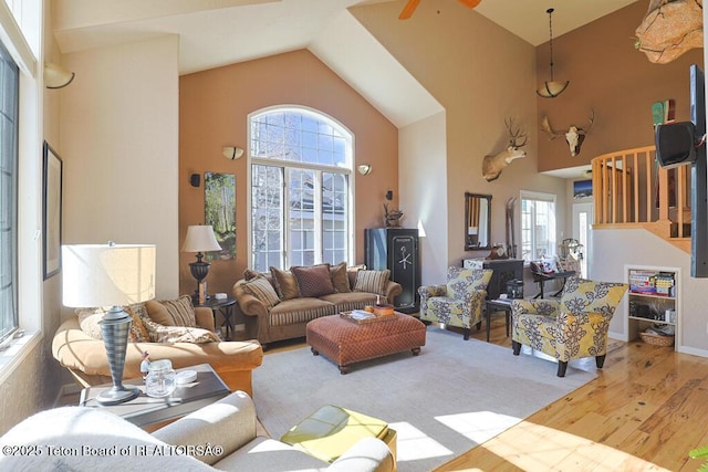 165 Cobble Creek Ln, Driggs, ID 83422 - living area with wood finished floors, high vaulted ceiling, and a ceiling fan