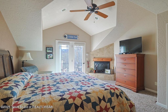 165 Cobble Creek Ln, Driggs, ID 83422 - bedroom with access to outside, carpet, vaulted ceiling, a textured wall, and baseboards
