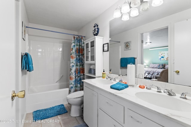 279 Vista E Dr, Star Valley Ranch, WY 83127 - full bathroom featuring tile patterned flooring, shower / bath combination with curtain, double vanity, toilet, and connected bathroom