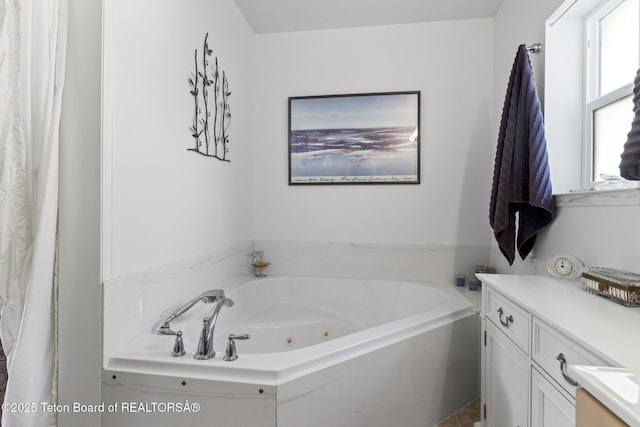 279 Vista E Dr, Star Valley Ranch, WY 83127 - full bathroom featuring a jetted tub and vanity