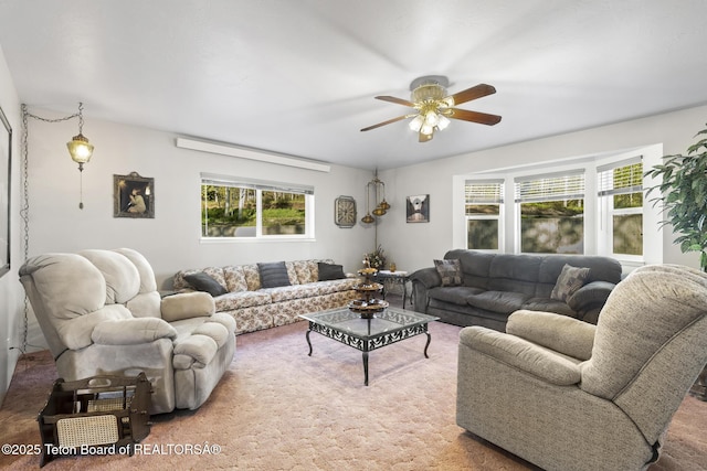 279 Vista E Dr, Star Valley Ranch, WY 83127 - carpeted living area with plenty of natural light and ceiling fan