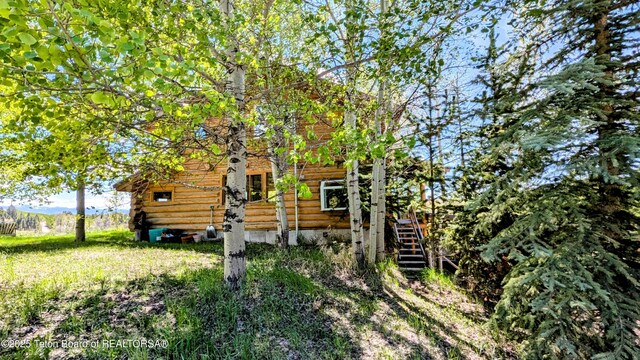 10559 Rammell Mountain Rd, Tetonia, ID 83452 - view of side of property featuring log exterior and stairway