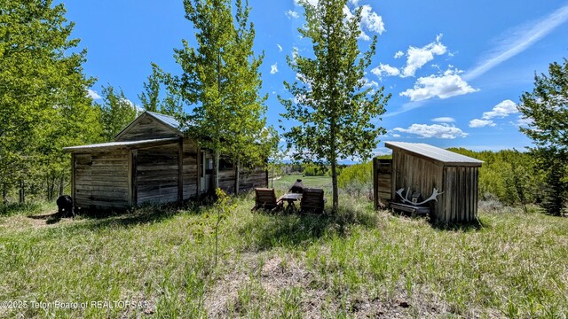 10559 Rammell Mountain Rd, Tetonia, ID 83452 - view of yard with an outdoor structure and a pole building