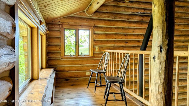 10559 Rammell Mountain Rd, Tetonia, ID 83452 - interior space featuring lofted ceiling, hardwood / wood-style flooring, rustic walls, and wood ceiling