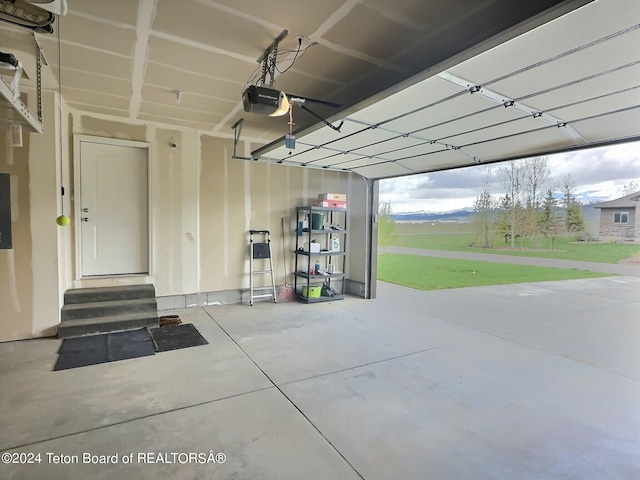 2929 Iron Wood Dr, Driggs, ID 83422 - garage with a garage door opener and electric panel