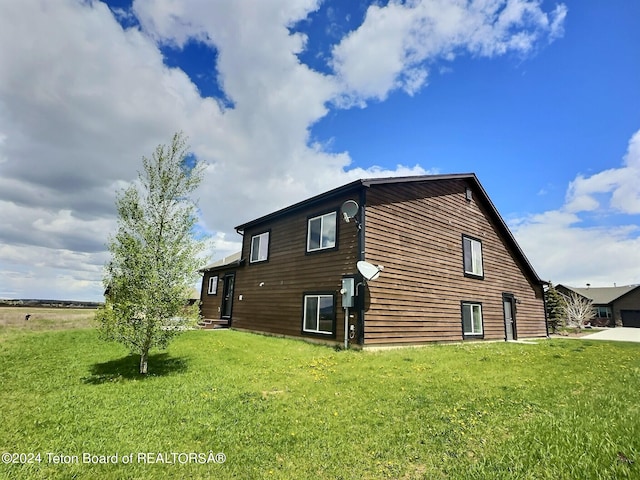 2929 Iron Wood Dr, Driggs, ID 83422 - view of side of home with a yard