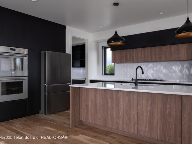 155 Sagewood Dr, Driggs, ID 83422 - kitchen with appliances with stainless steel finishes, modern cabinets, and light countertops