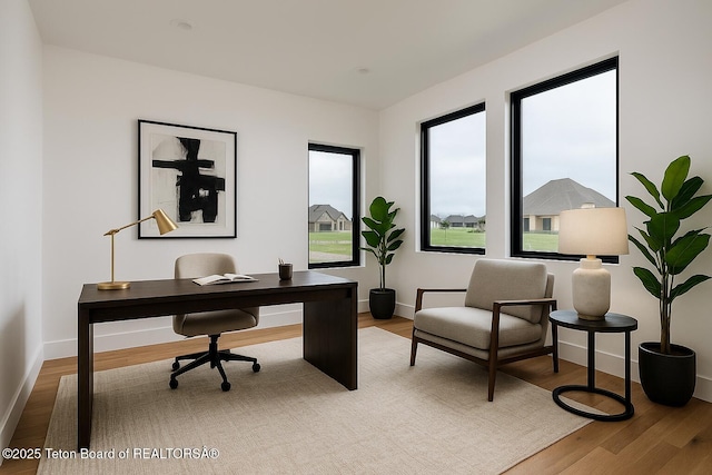 155 Sagewood Dr, Driggs, ID 83422 - office area featuring baseboards and wood finished floors