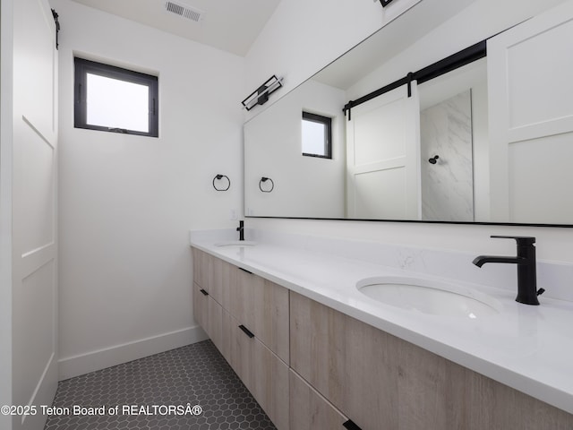 155 Sagewood Dr, Driggs, ID 83422 - bathroom featuring double vanity and baseboards