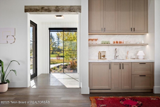 900 Mountain Bluebird Ct, Driggs, ID 83422 - indoor wet bar featuring dark wood-type flooring and decorative backsplash