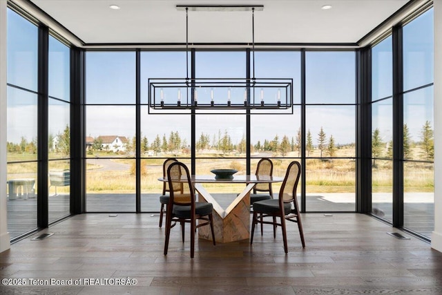 900 Mountain Bluebird Ct, Driggs, ID 83422 - sunroom / solarium with a chandelier