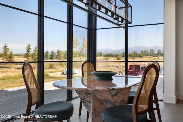 900 Mountain Bluebird Ct, Driggs, ID 83422 - sunroom / solarium featuring a mountain view and healthy amount of natural light