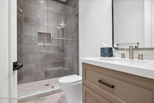 900 Mountain Bluebird Ct, Driggs, ID 83422 - bathroom featuring toilet, vanity, and a shower stall