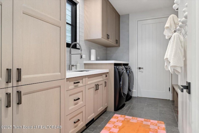 900 Mountain Bluebird Ct, Driggs, ID 83422 - laundry area with cabinet space, separate washer and dryer, and dark tile patterned floors
