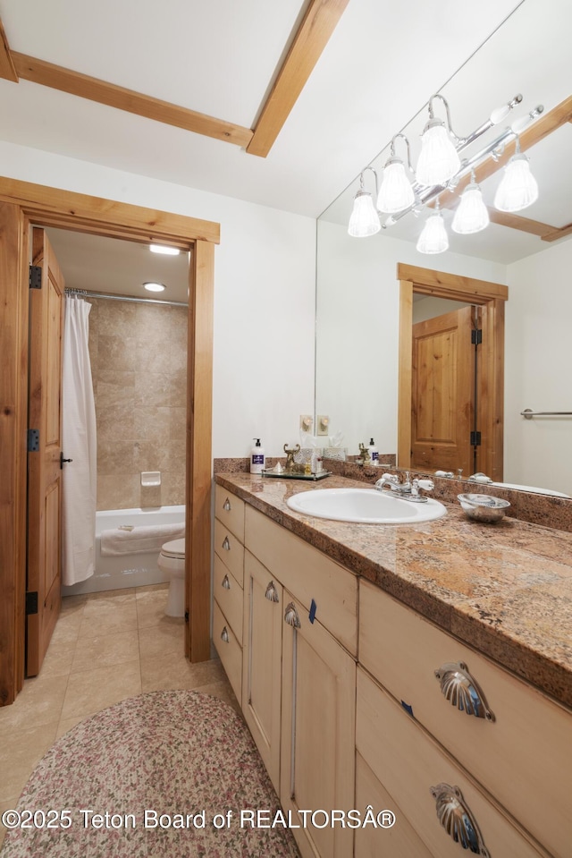 500 E Solitude Dr, Jackson, WY 83001 - full bathroom featuring toilet, vanity, shower / bathtub combination with curtain, and tile patterned floors