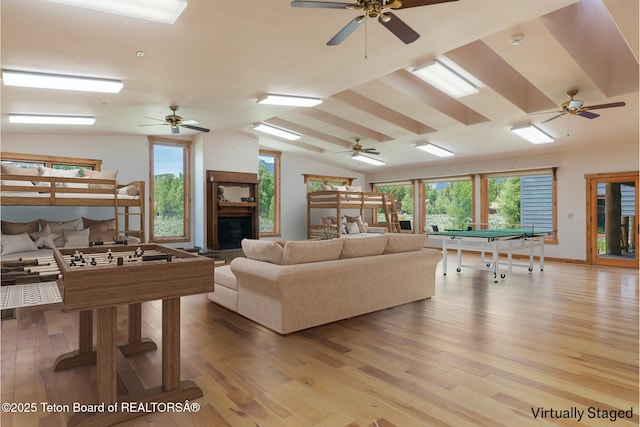 500 E Solitude Dr, Jackson, WY 83001 - living area featuring a ceiling fan, light wood finished floors, and lofted ceiling