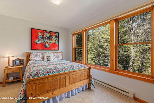 25655 Buffalo Run, Moran, WY 83013 - carpeted bedroom with a baseboard radiator and baseboards