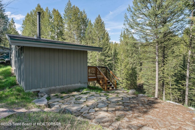 25655 Buffalo Run, Moran, WY 83013 - view of outbuilding with a forest view and stairway