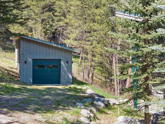 25655 Buffalo Run, Moran, WY 83013 - detached garage with a forest view