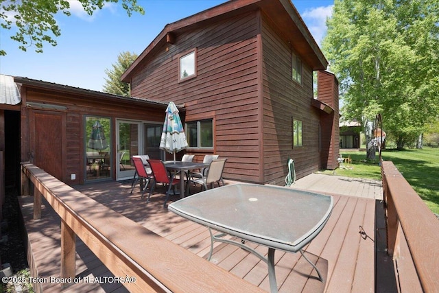 3470 S Winding Trail Dr, Jackson, WY 83001 - deck featuring outdoor dining space